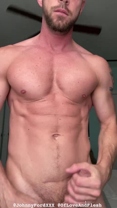 Hot guy masturbating on top of his bed
