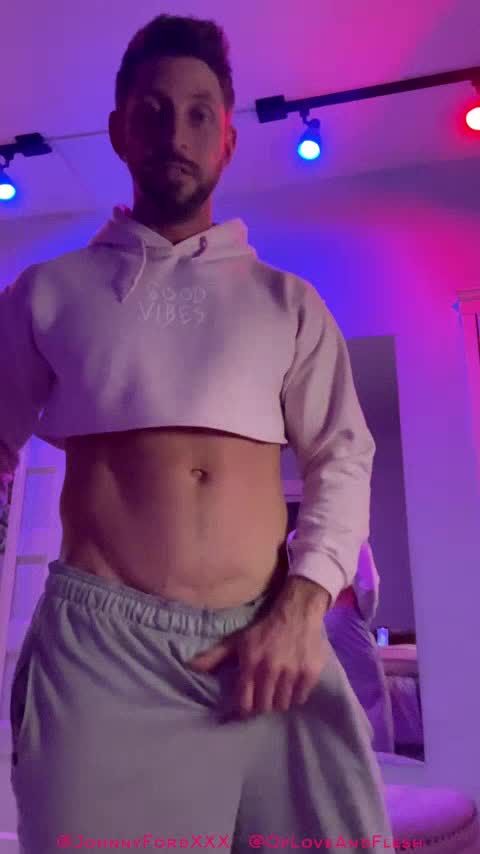 Johnny in a Pink Crop top and rides his favorite toy