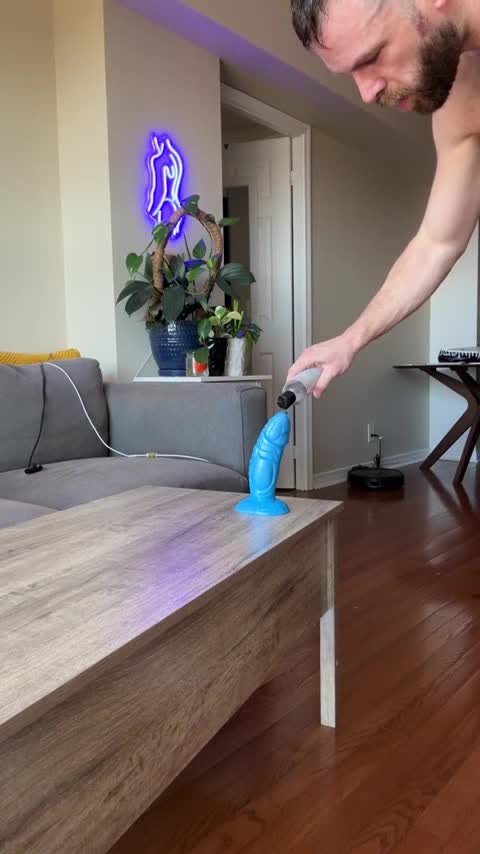 Riding his new blue Toy