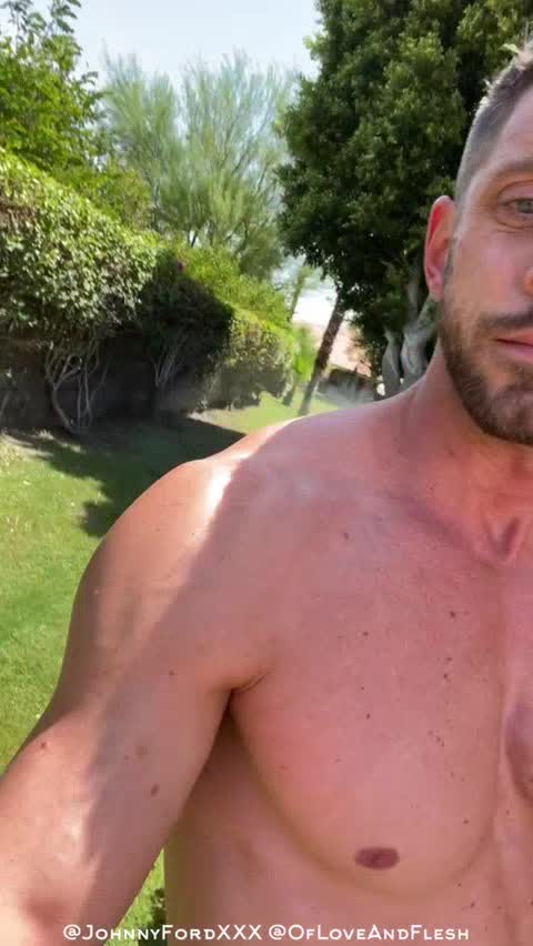 Using his garden sprinkler as lubricant